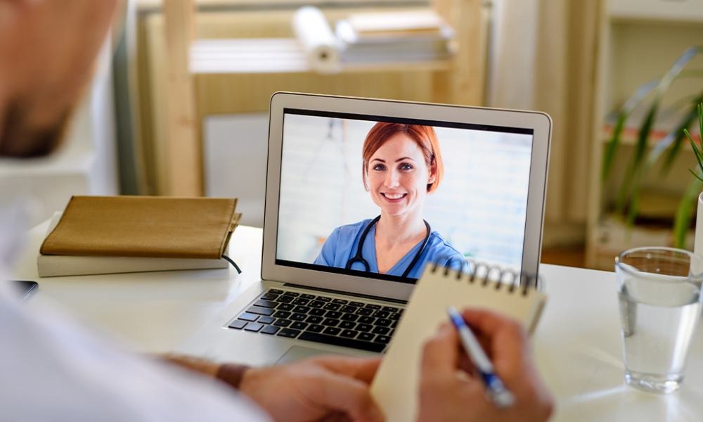 Man receiving Telehealth advice from a doctor via video